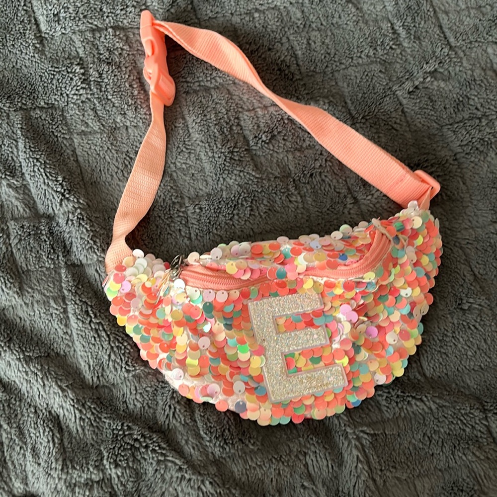 Justice pink “e” belt bag